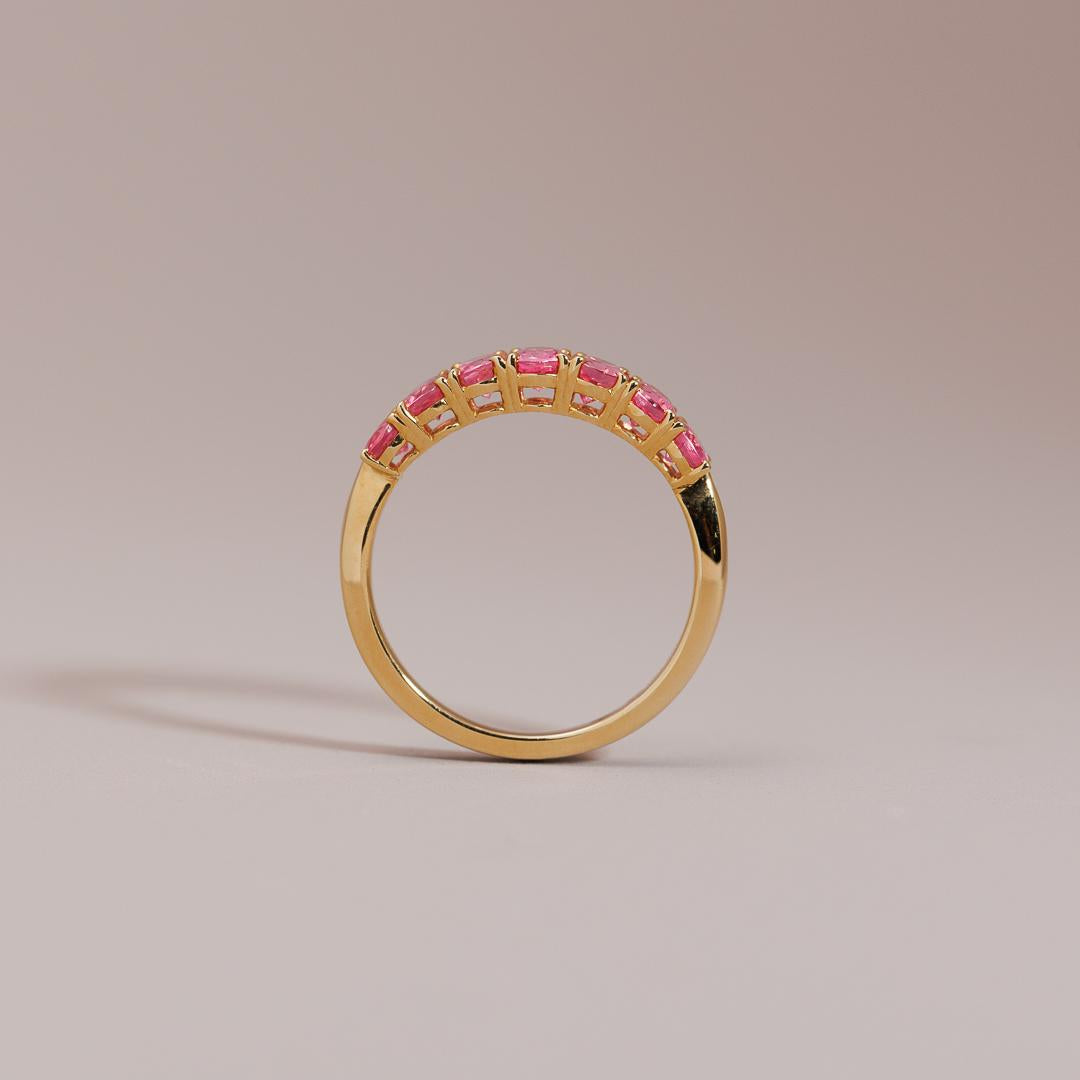 Multi oval pink spinel layer ring