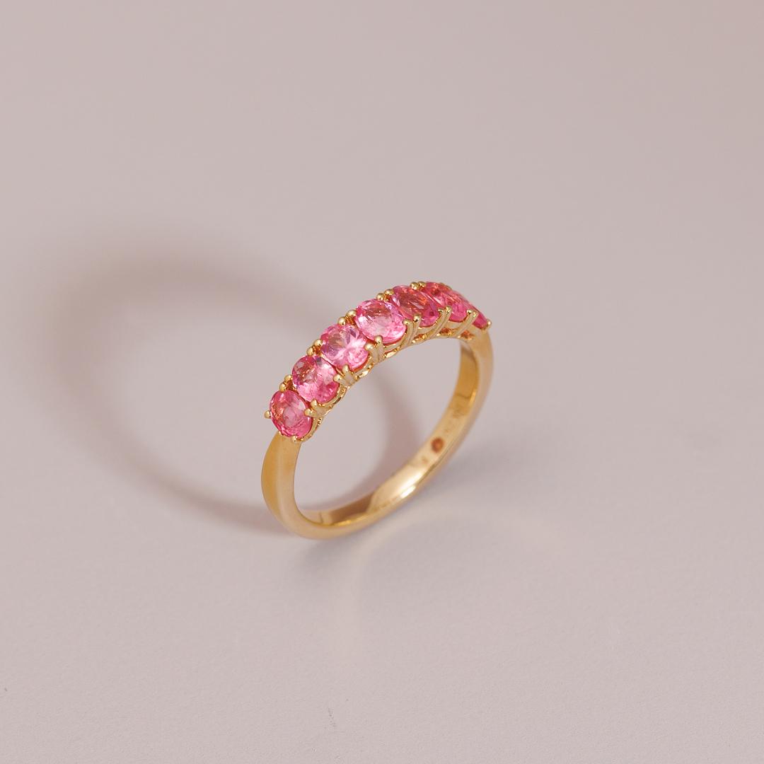 Multi oval pink spinel layer ring
