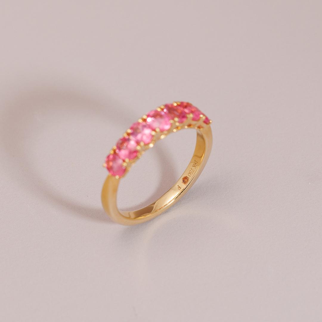 Multi oval pink spinel layer ring