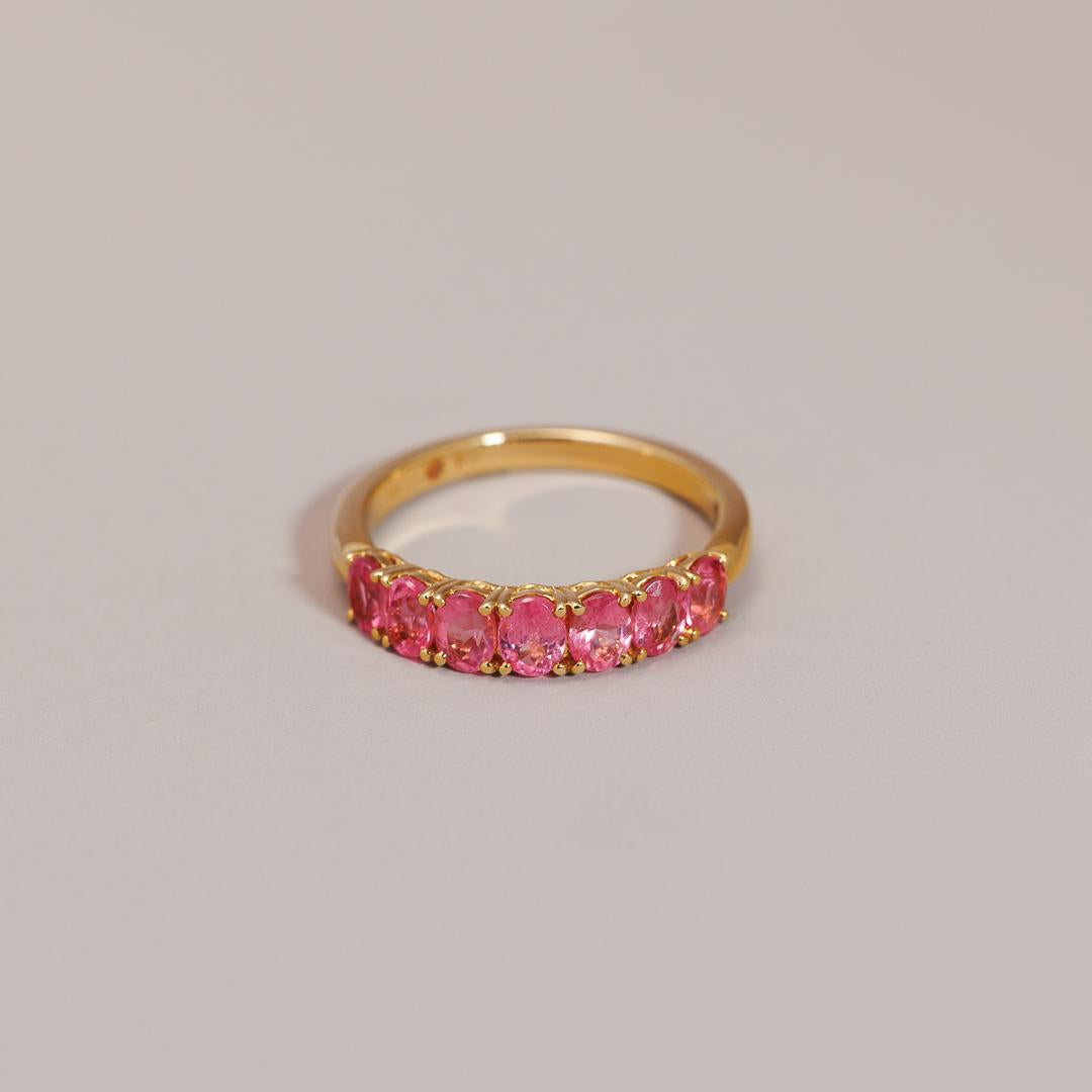 Multi oval pink spinel layer ring