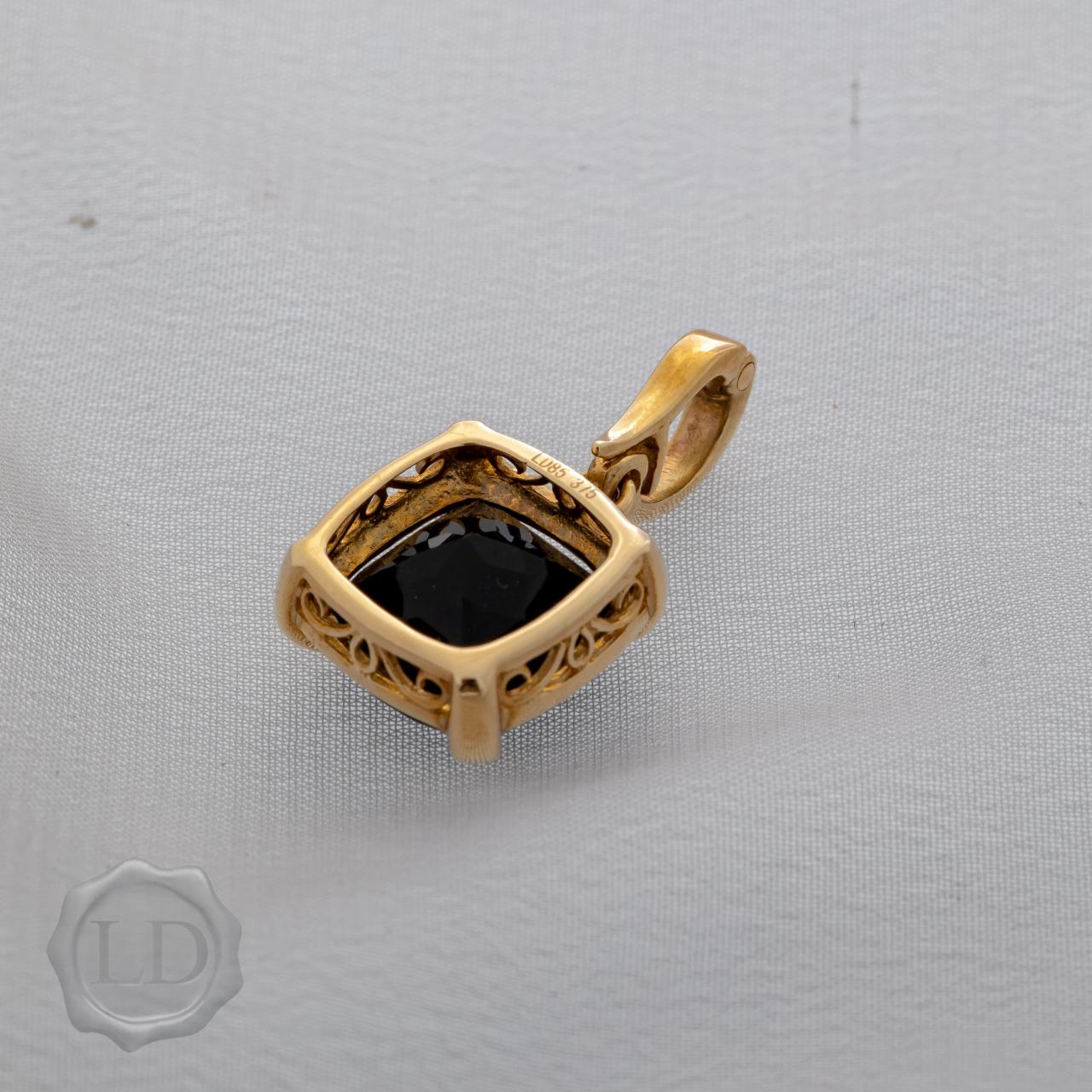 Facet onyx enhancer pendant