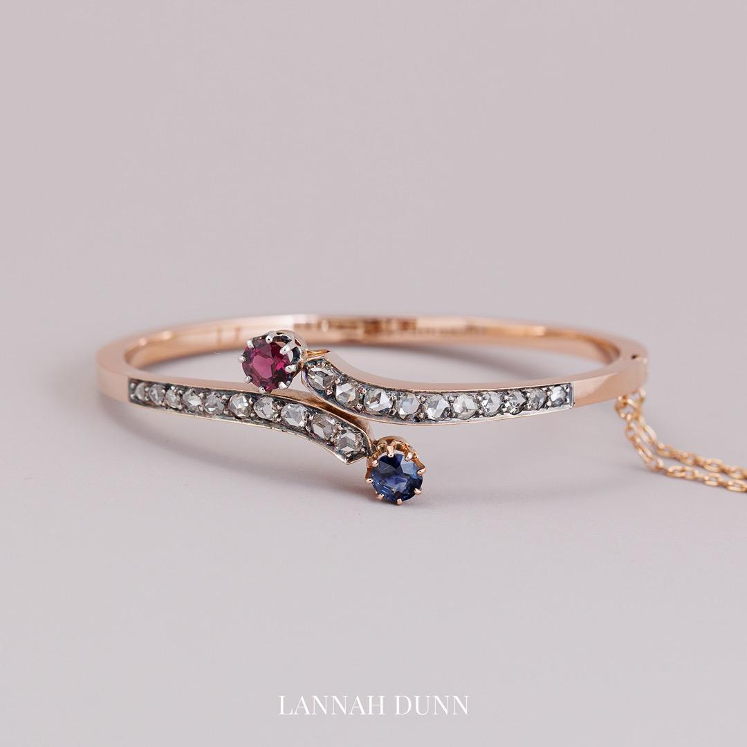 French diamond sapphire and red garnet bangle