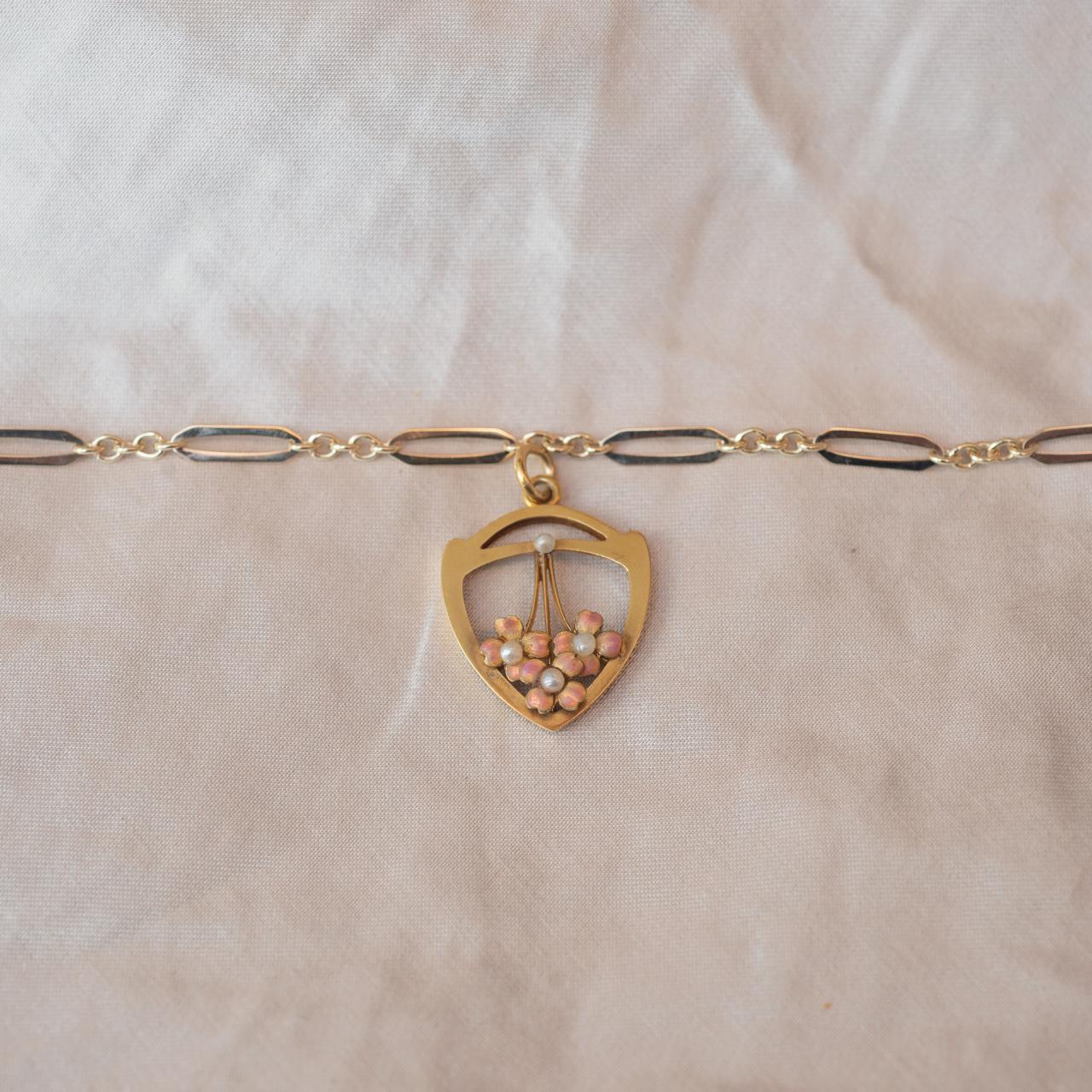 High-carat, charming enamel & pearl pendant