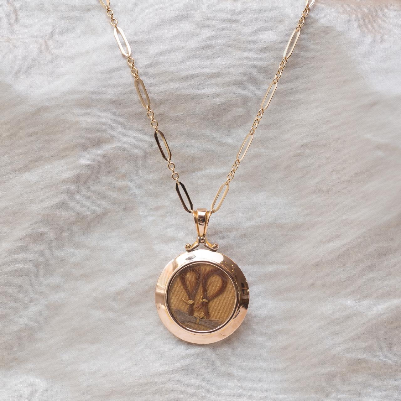 Hallmarked antique open locket