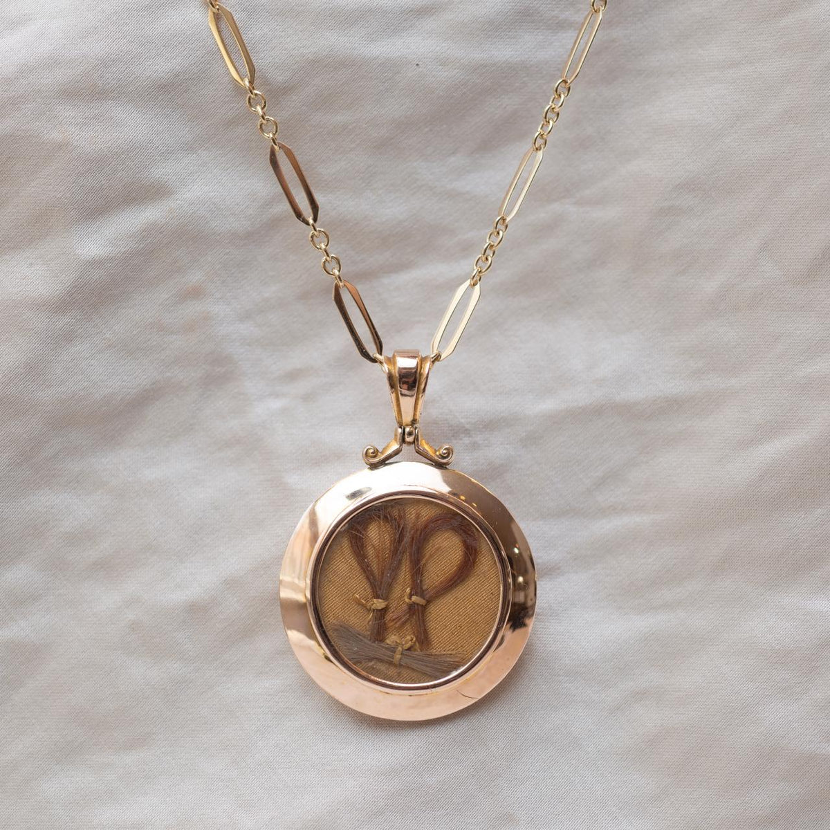 Hallmarked antique open locket