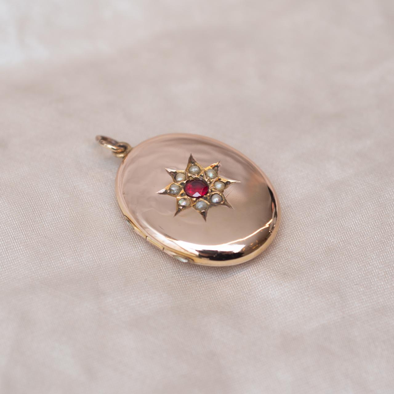 Antique oval stone set locket