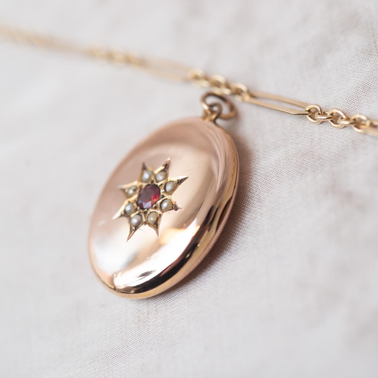 Antique oval stone set locket