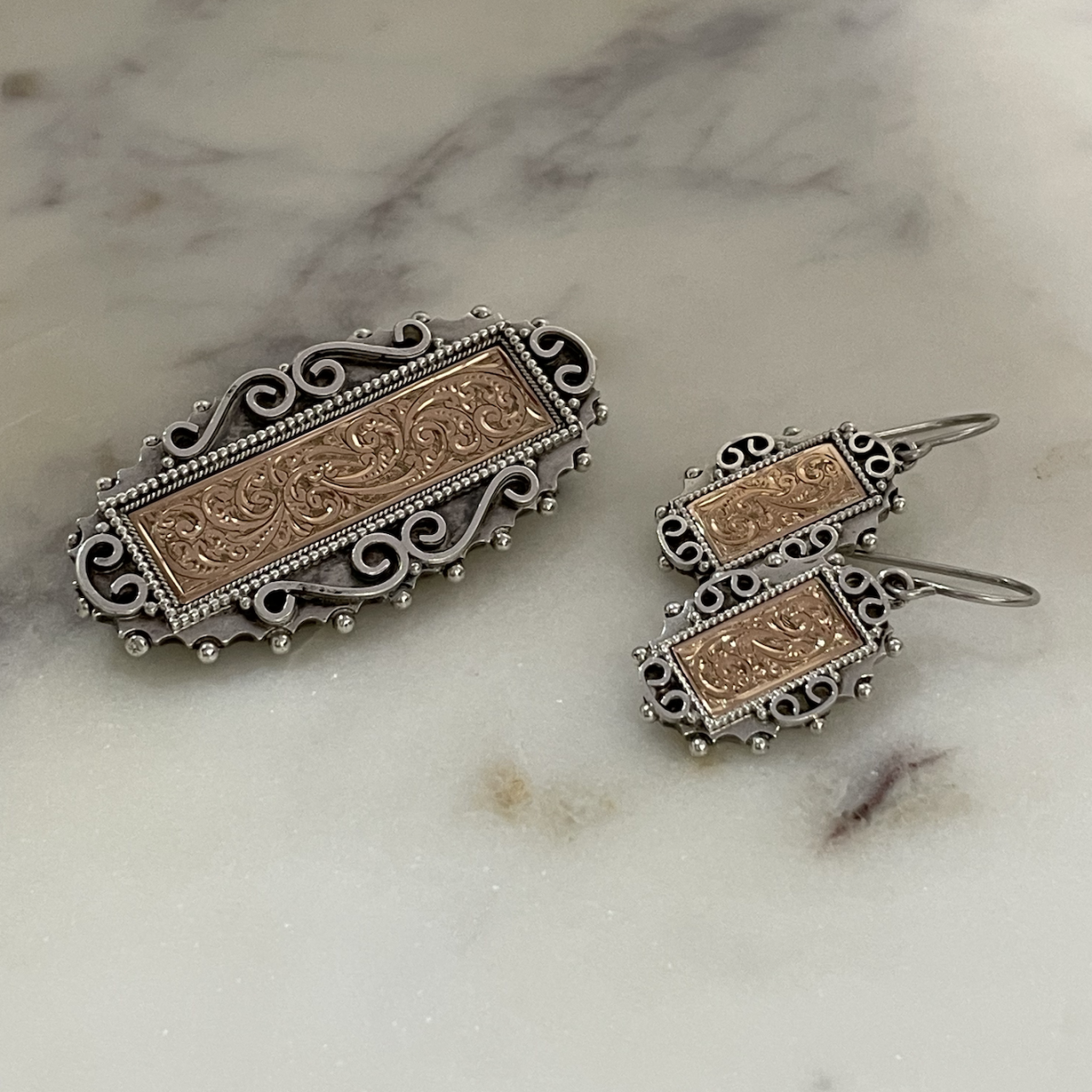 Silver and gold applied locket-back brooch and earrings set