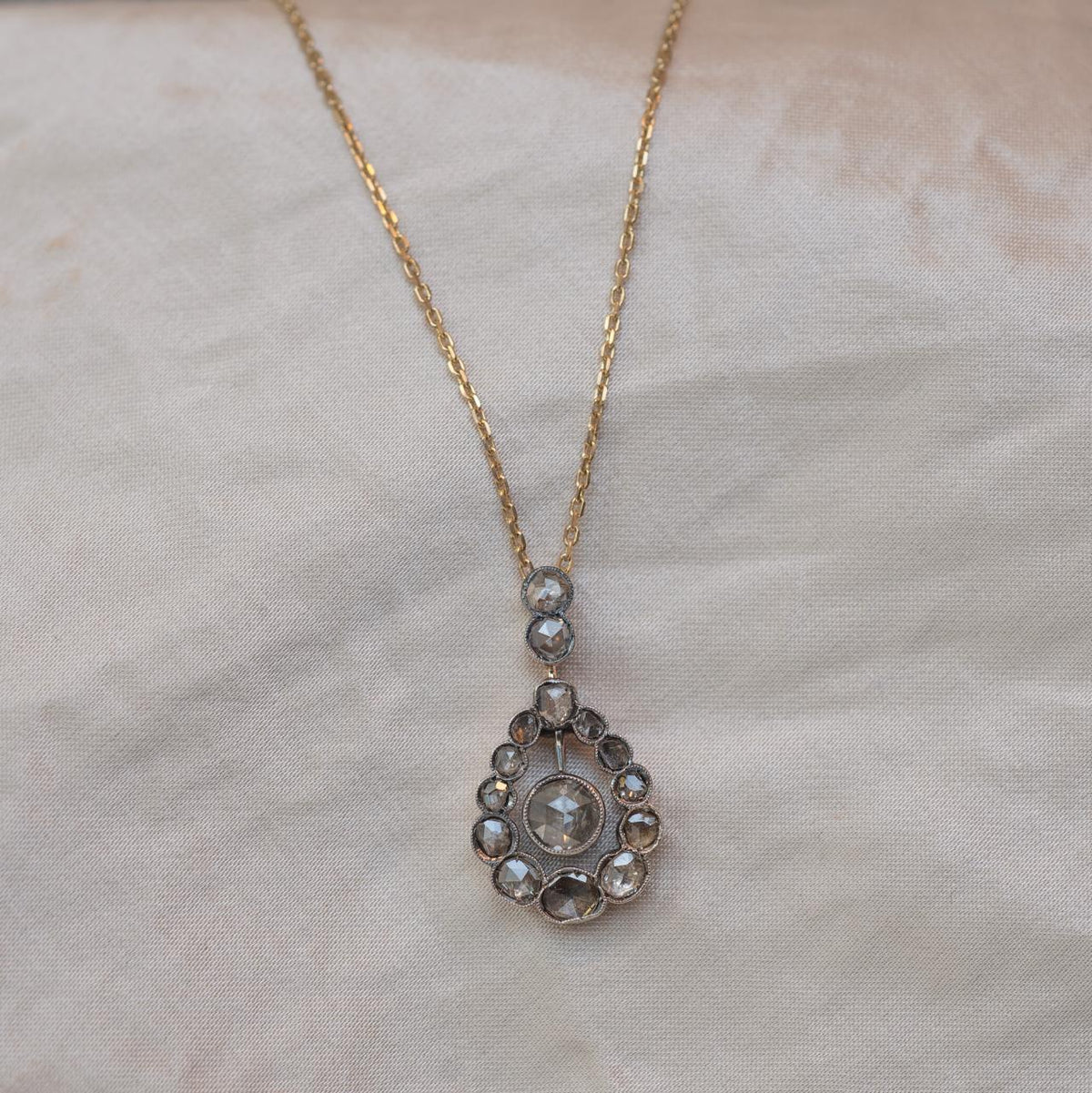 Moody diamond antique pendant