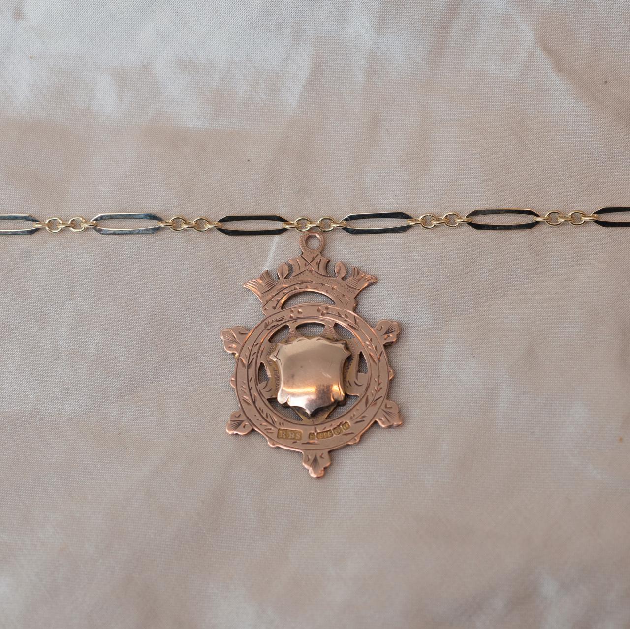 Antique gold medal