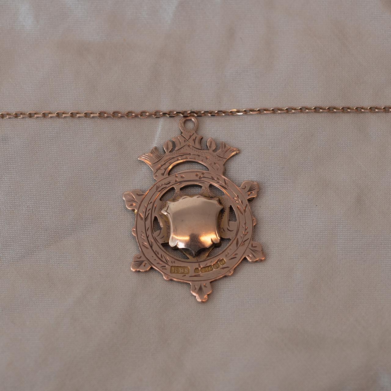 Antique gold medal
