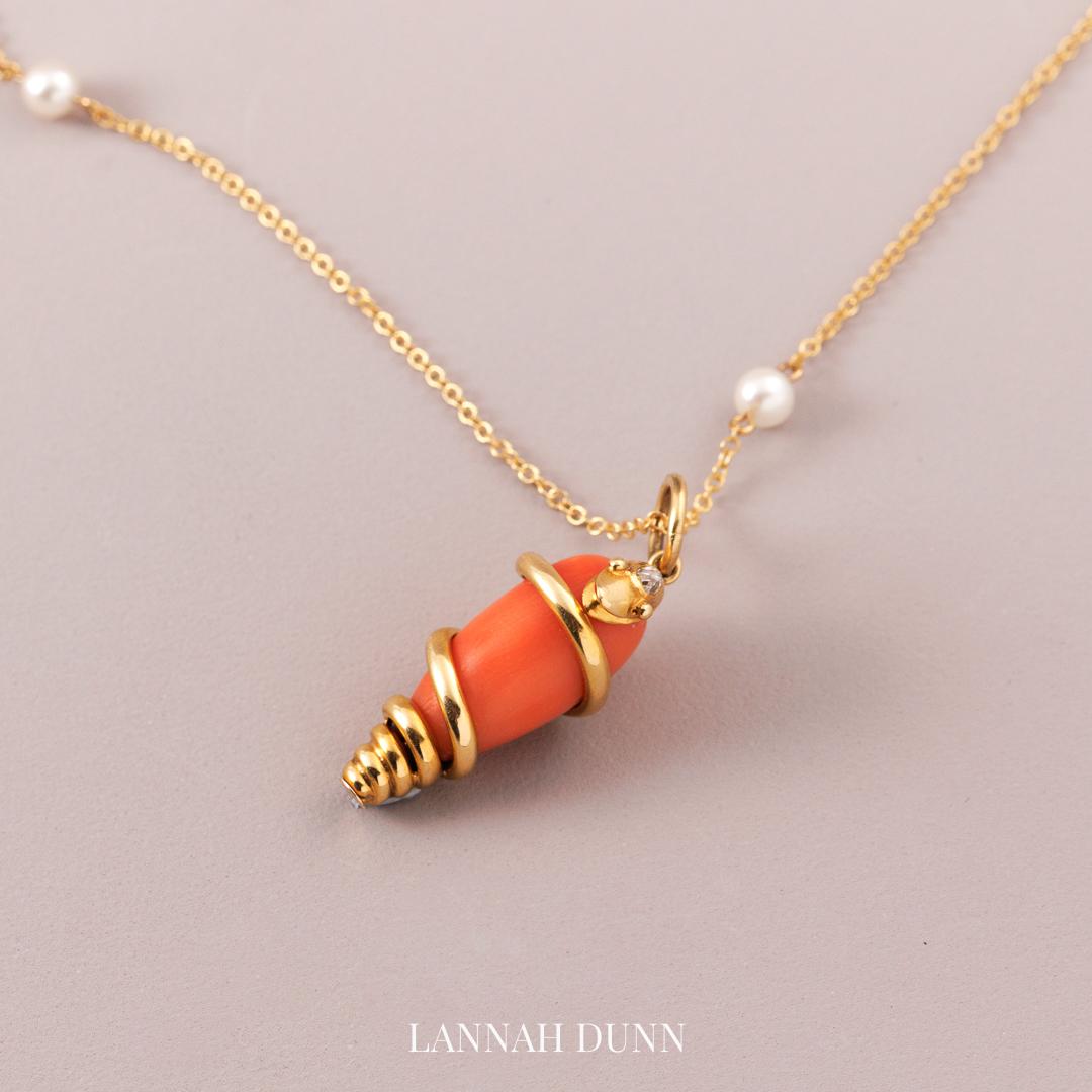 Coral & diamond serpent pendant