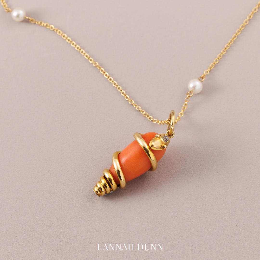 Coral & diamond serpent pendant