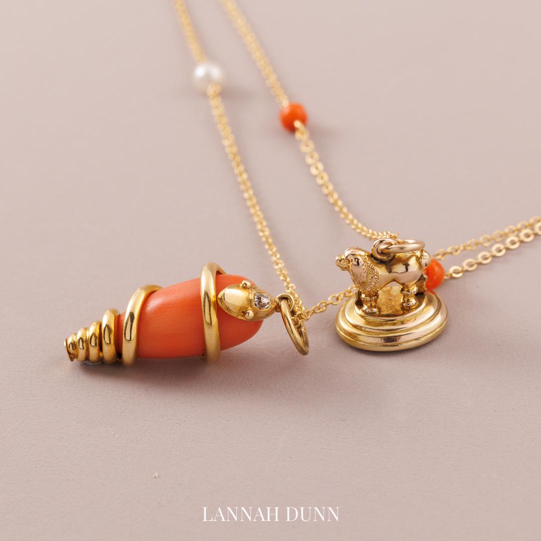 Coral & diamond serpent pendant