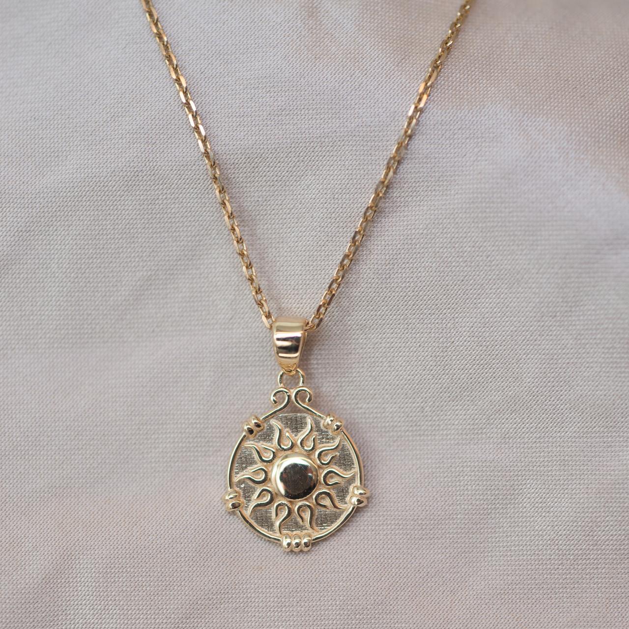 LD Greek sun disc pendant