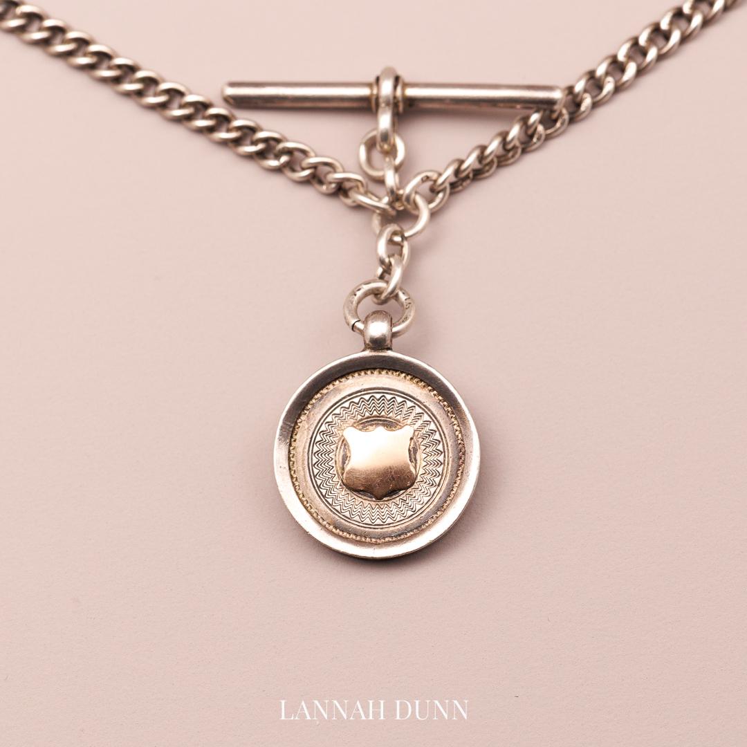 Silver fob chain, all hallmarked with T-bar and medal