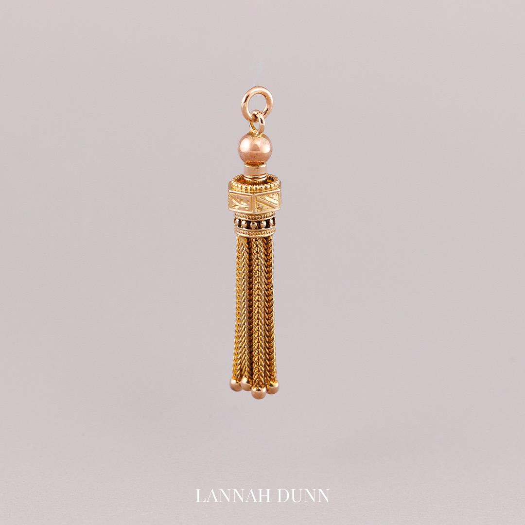 Antique tassel pendant