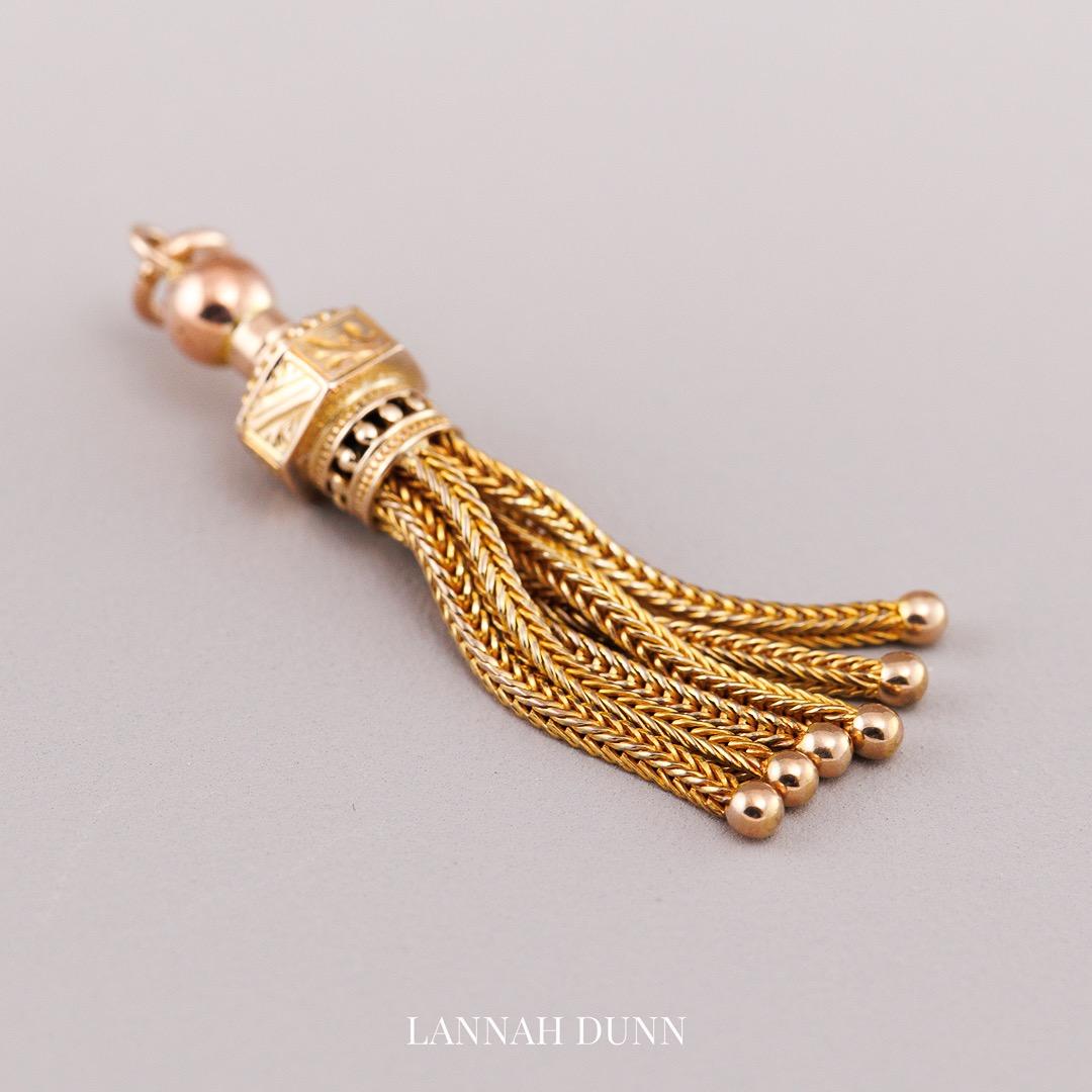 Antique tassel pendant