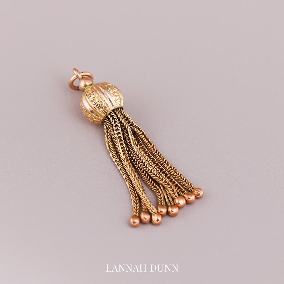 Antique tassel pendant