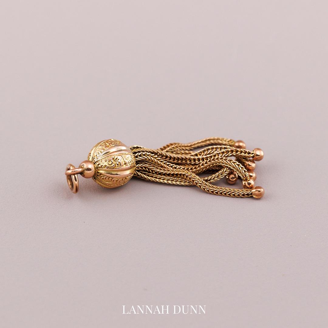 Antique tassel pendant