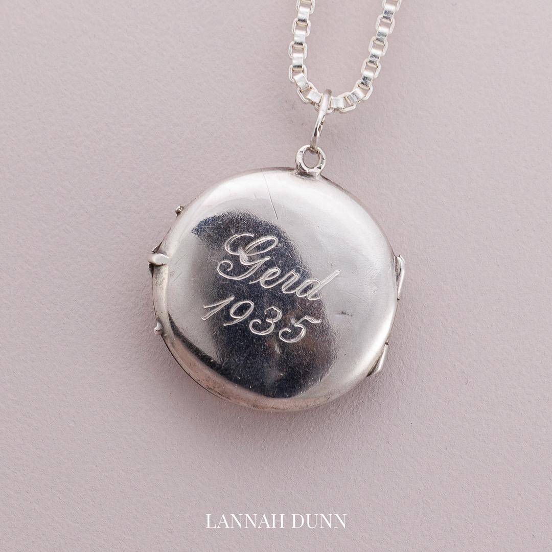 Antique silver flower locket