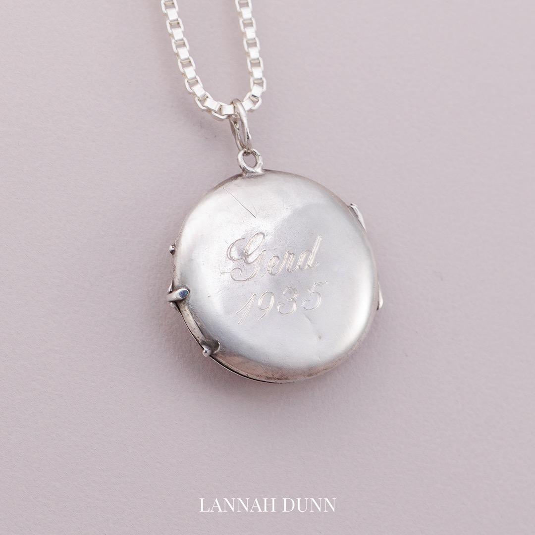 Antique silver flower locket