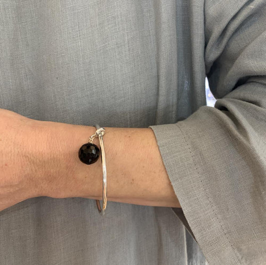 Sterling silver onyx drop bangle Sterling silver onyx drop bangle