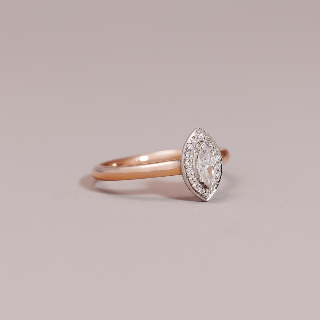 Marquise cut engagment ring with rose & white gold