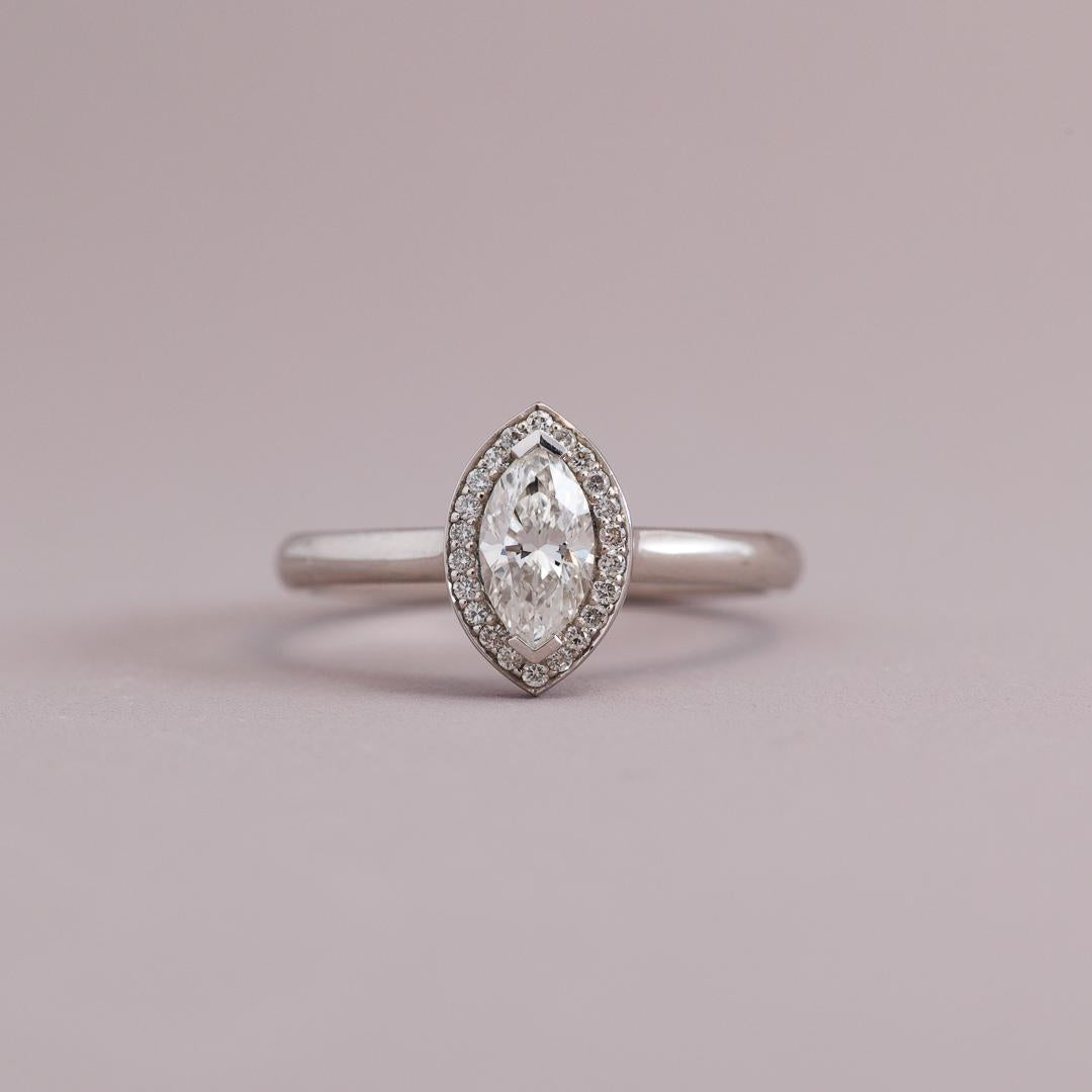 Marquise cut halo engagement ring