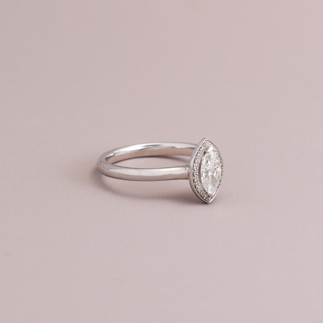 Marquise cut halo engagement ring