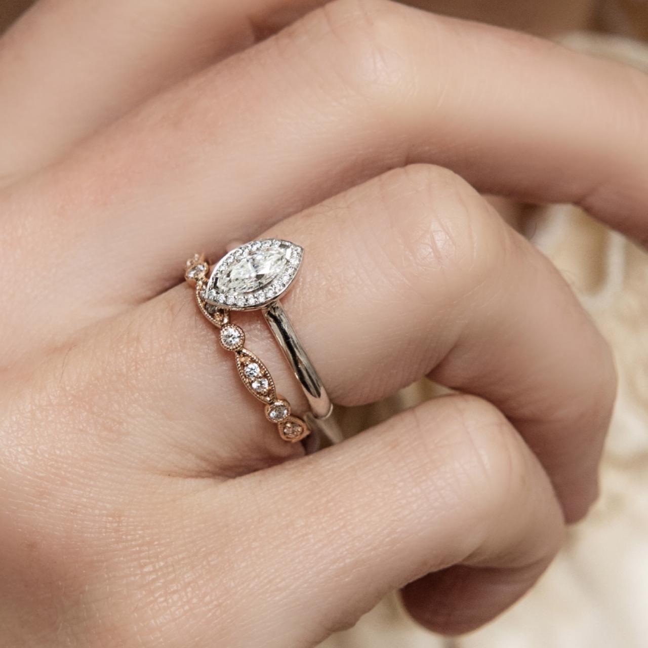 Marquise cut halo engagement ring