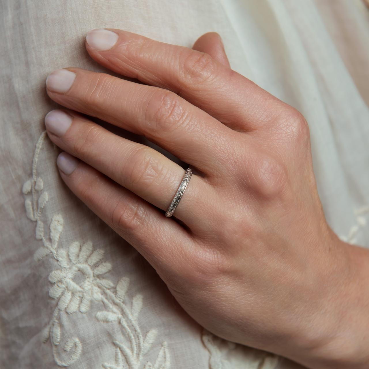 Vintage platinum carved eternity band