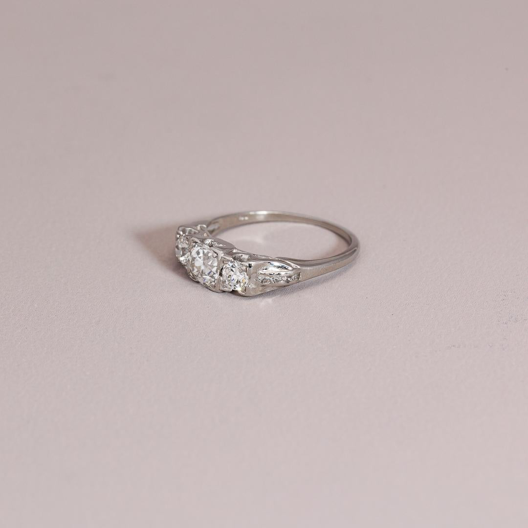 Art Deco diamond three stone in Platinum