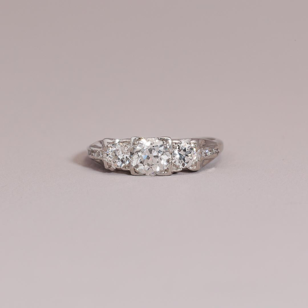 Art Deco diamond three stone in Platinum