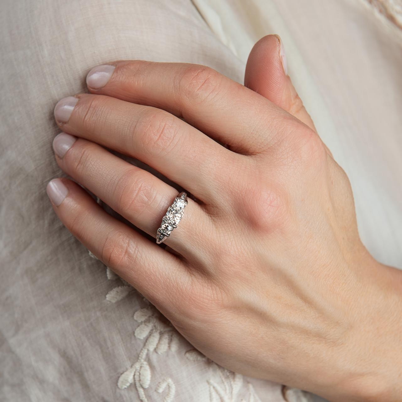 Art Deco diamond three stone in Platinum