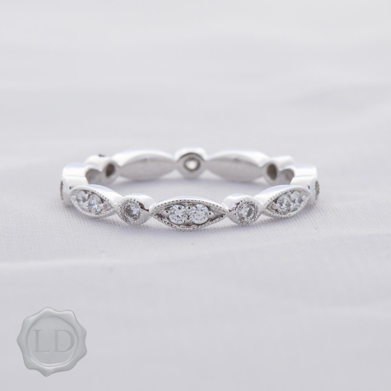 The LD diamond marquise & round continuum band, full circle of diamonds inwhite gold
