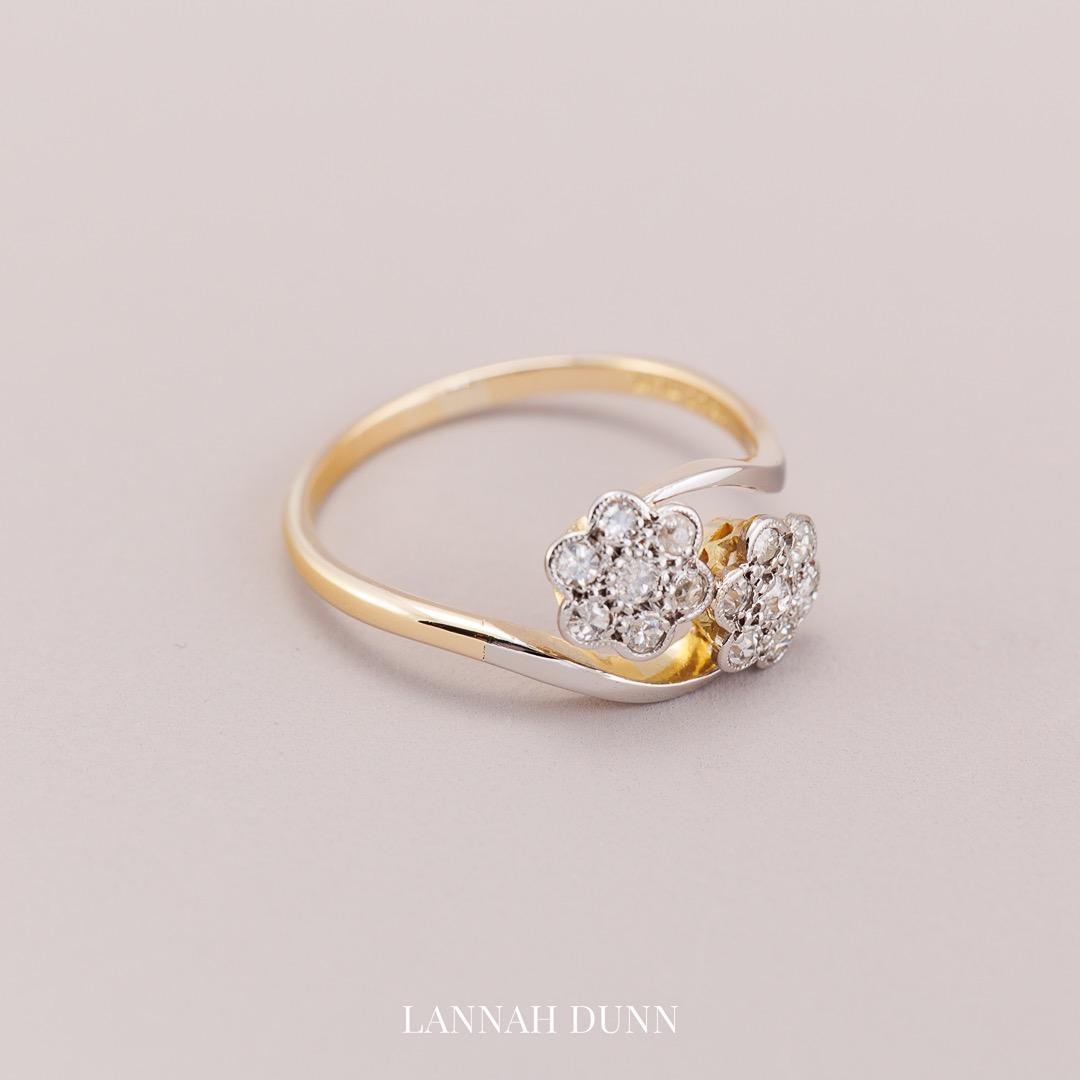 Vintage double daisy diamond twist ring
