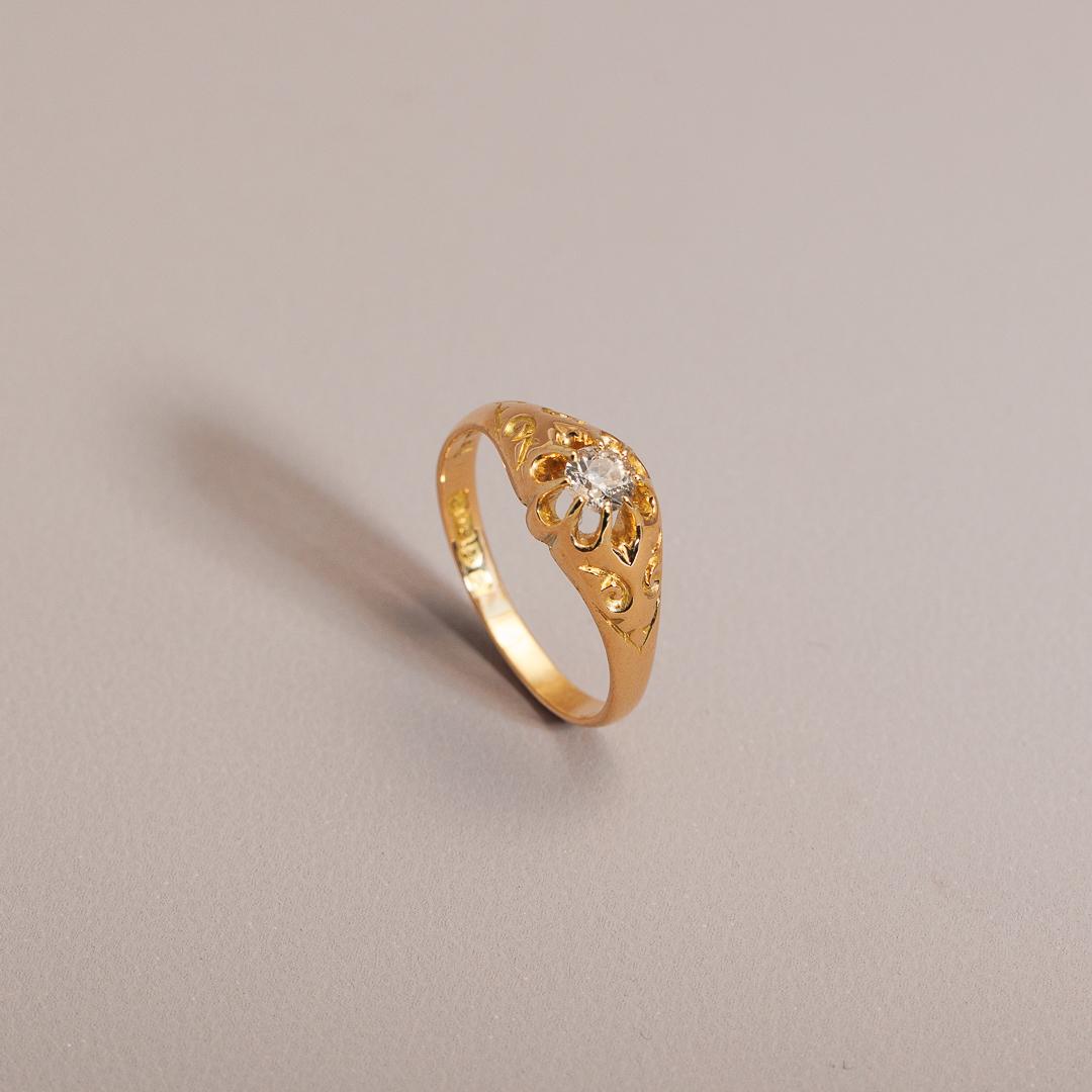 Antique carved yellow gold single old cut diamond ring