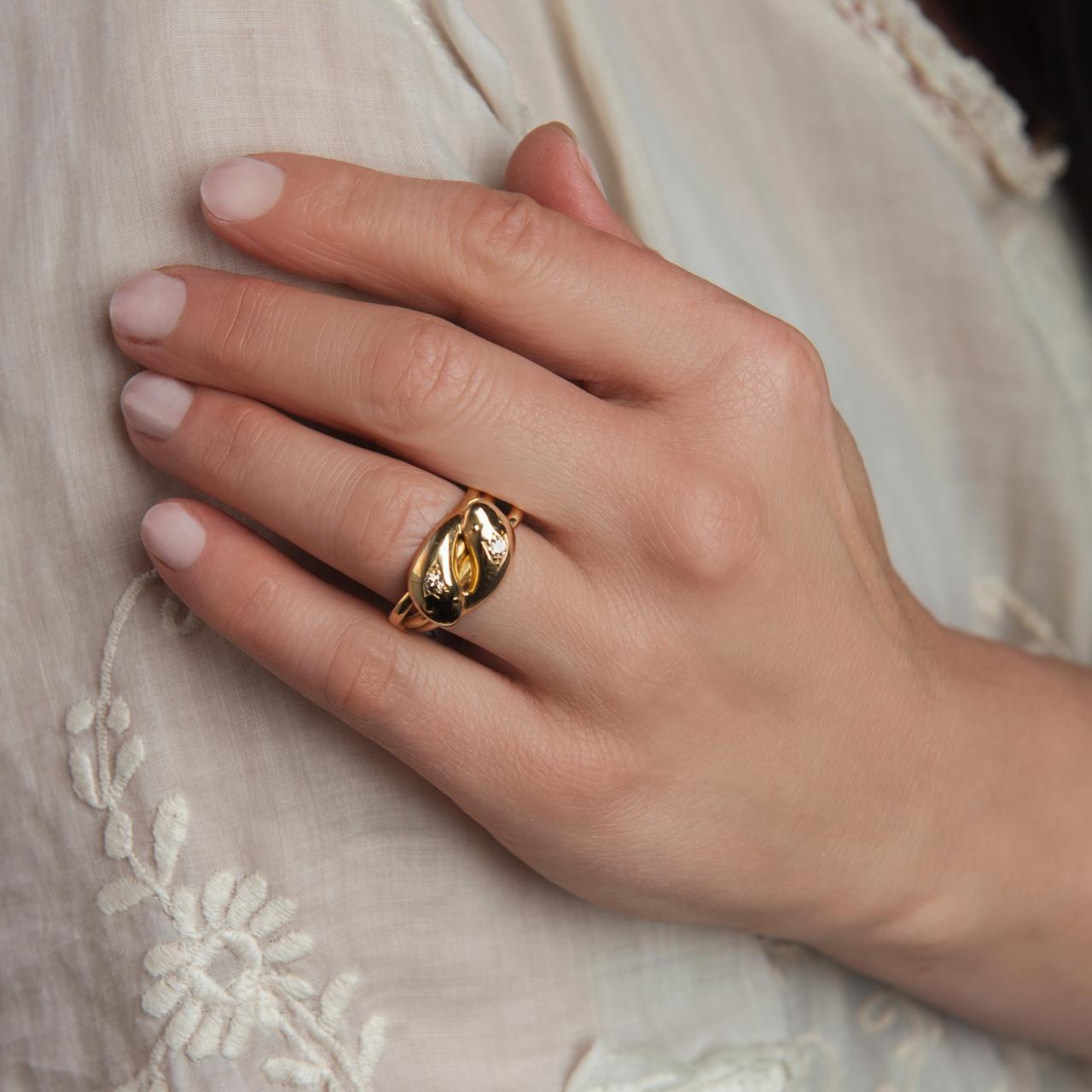 Heavy, entwined Double headed serpent eternity ring