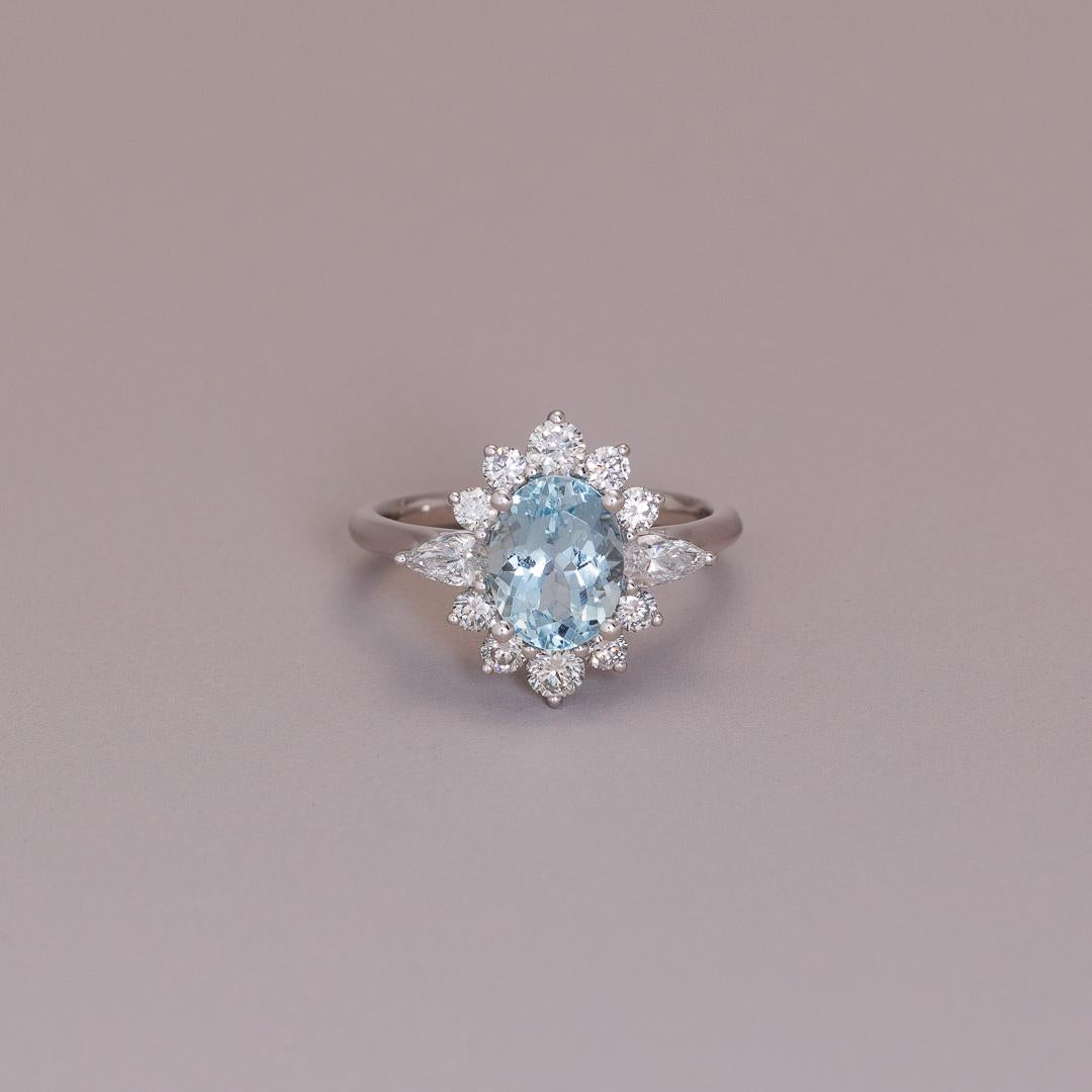 Fancy cut diamond & Aquamarine oval cluster