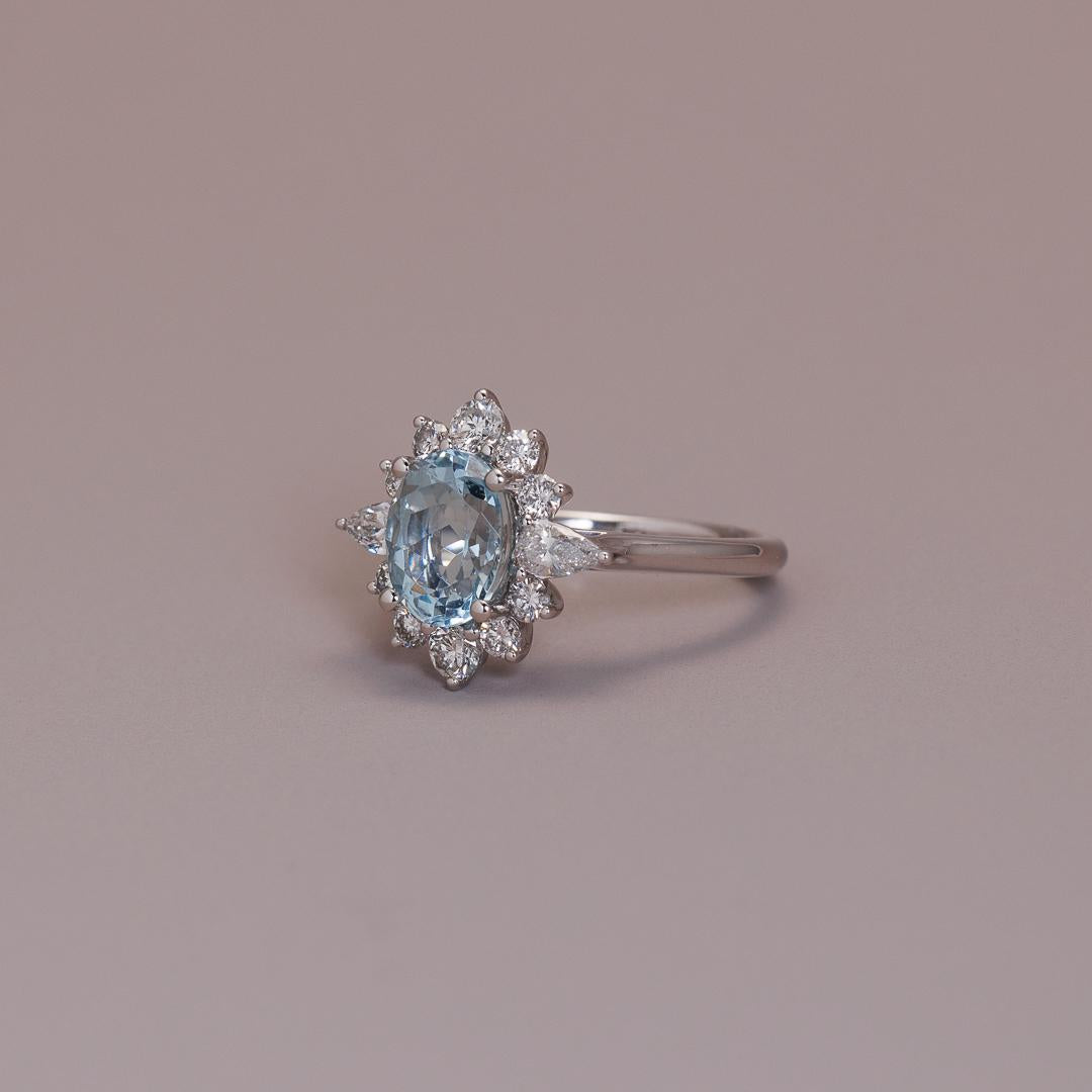 Fancy cut diamond & Aquamarine oval cluster