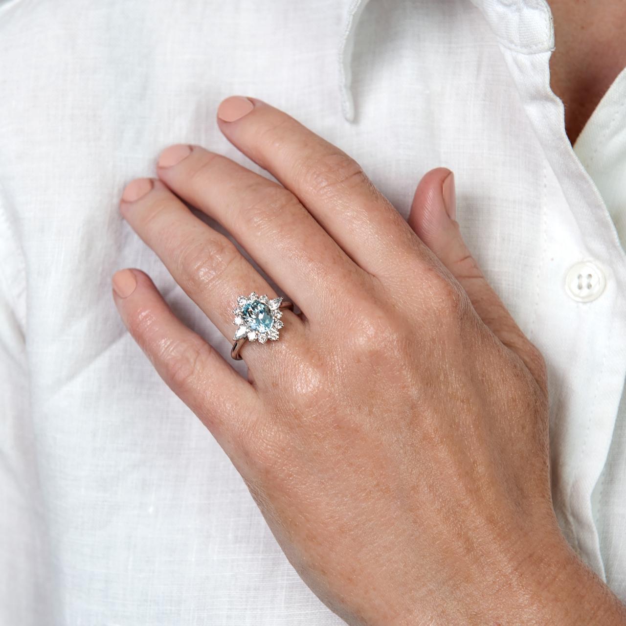 Fancy cut diamond & Aquamarine oval cluster