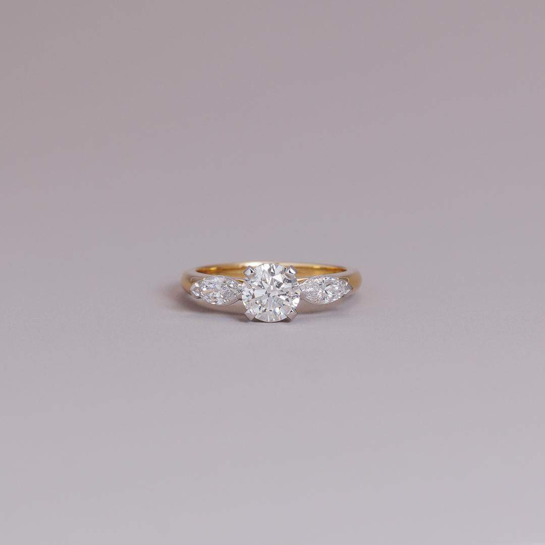 LD Design round brilliant cut & marquise three stone engagement ring in 18ct yellow gold and platinum