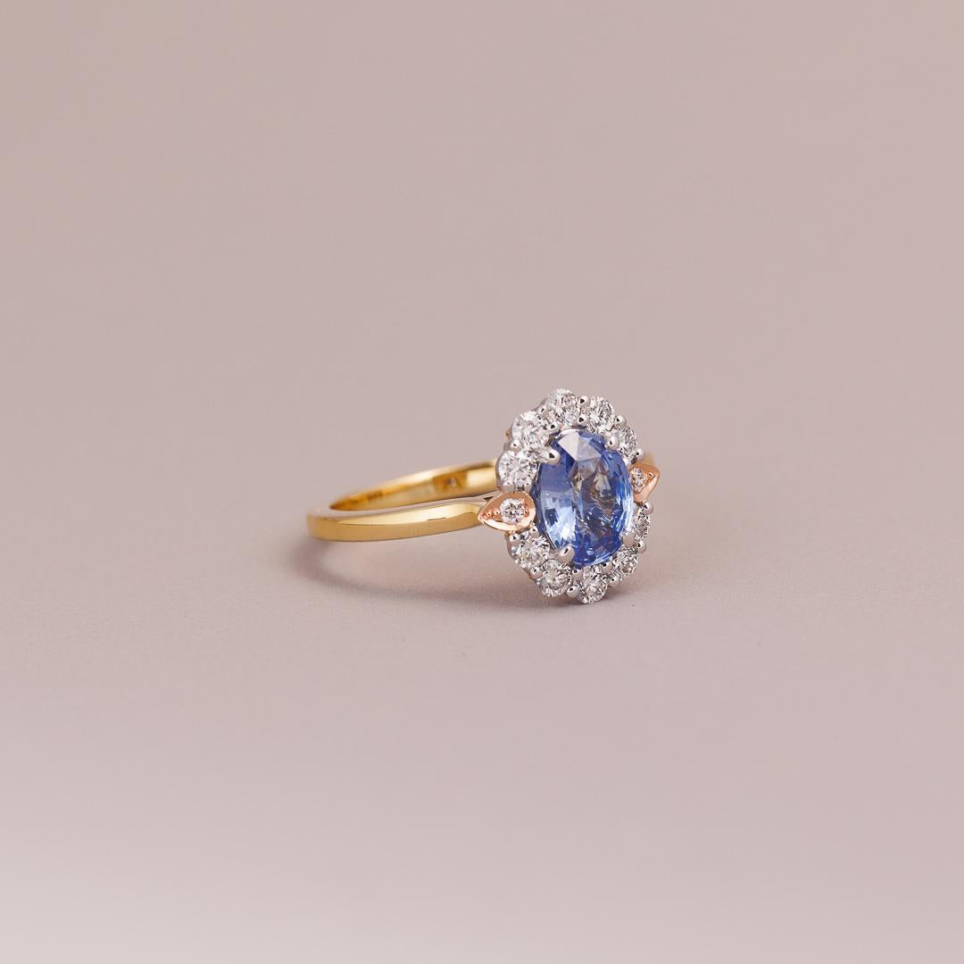 Oval cut Ceylon Sapphire and diamond engagement ring