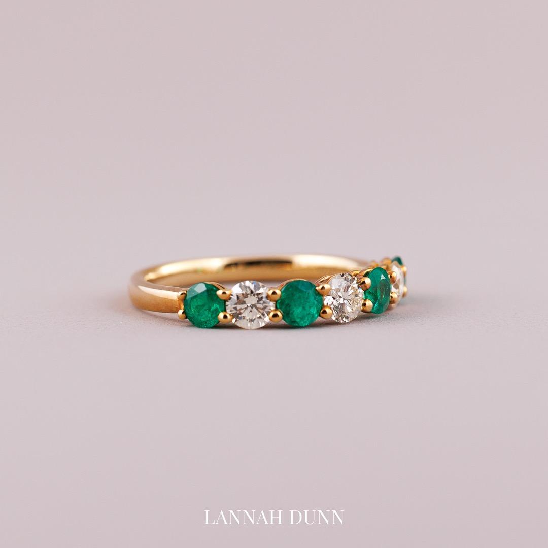 Natural emerald & diamond half eternity wedding ring