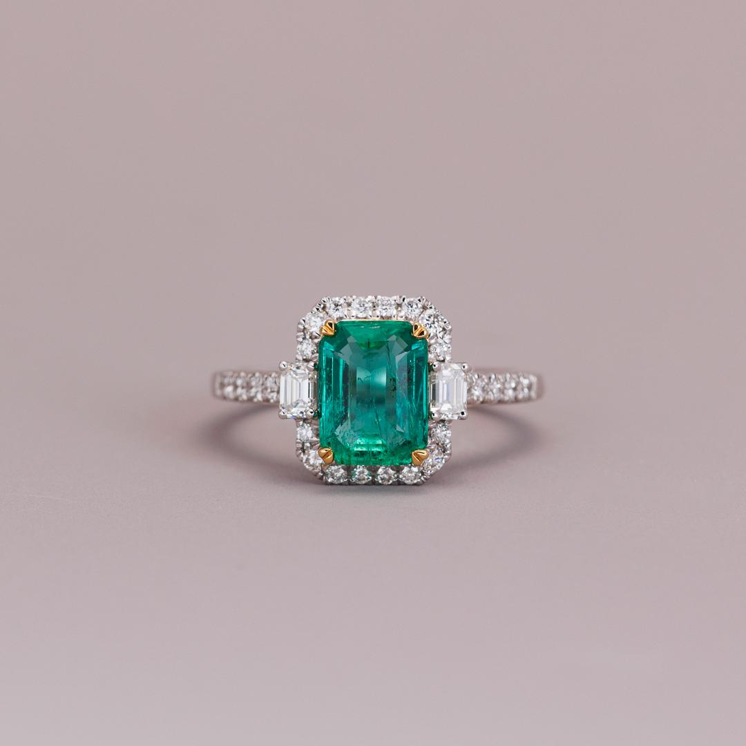 Emerald and diamond art deco style engagement ring
