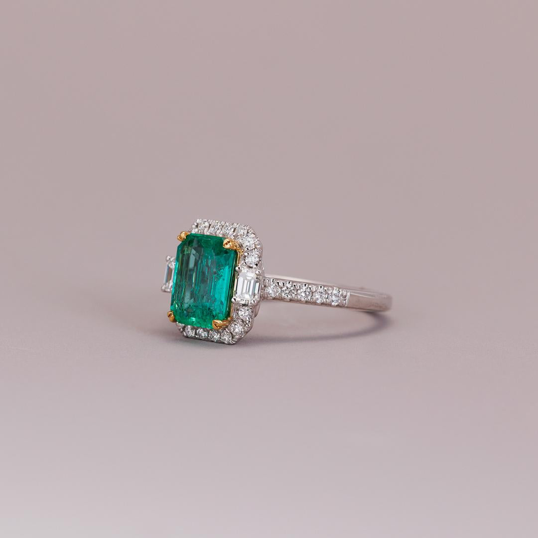 Emerald and diamond art deco style engagement ring