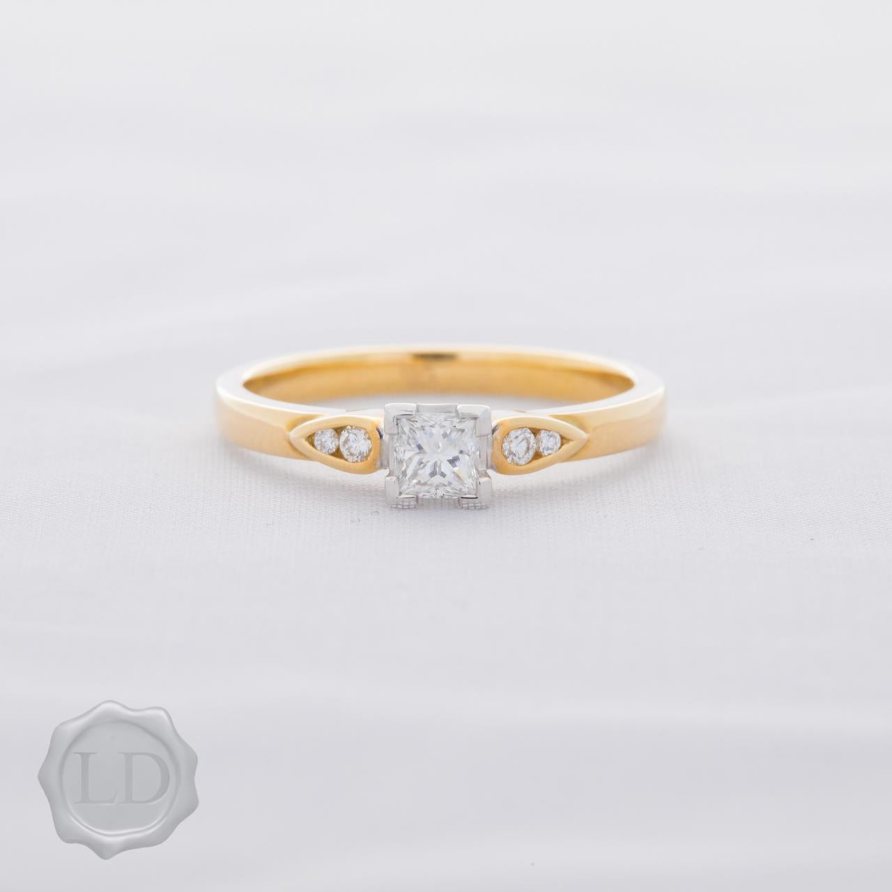 Yellow gold princess cut solitaire ring