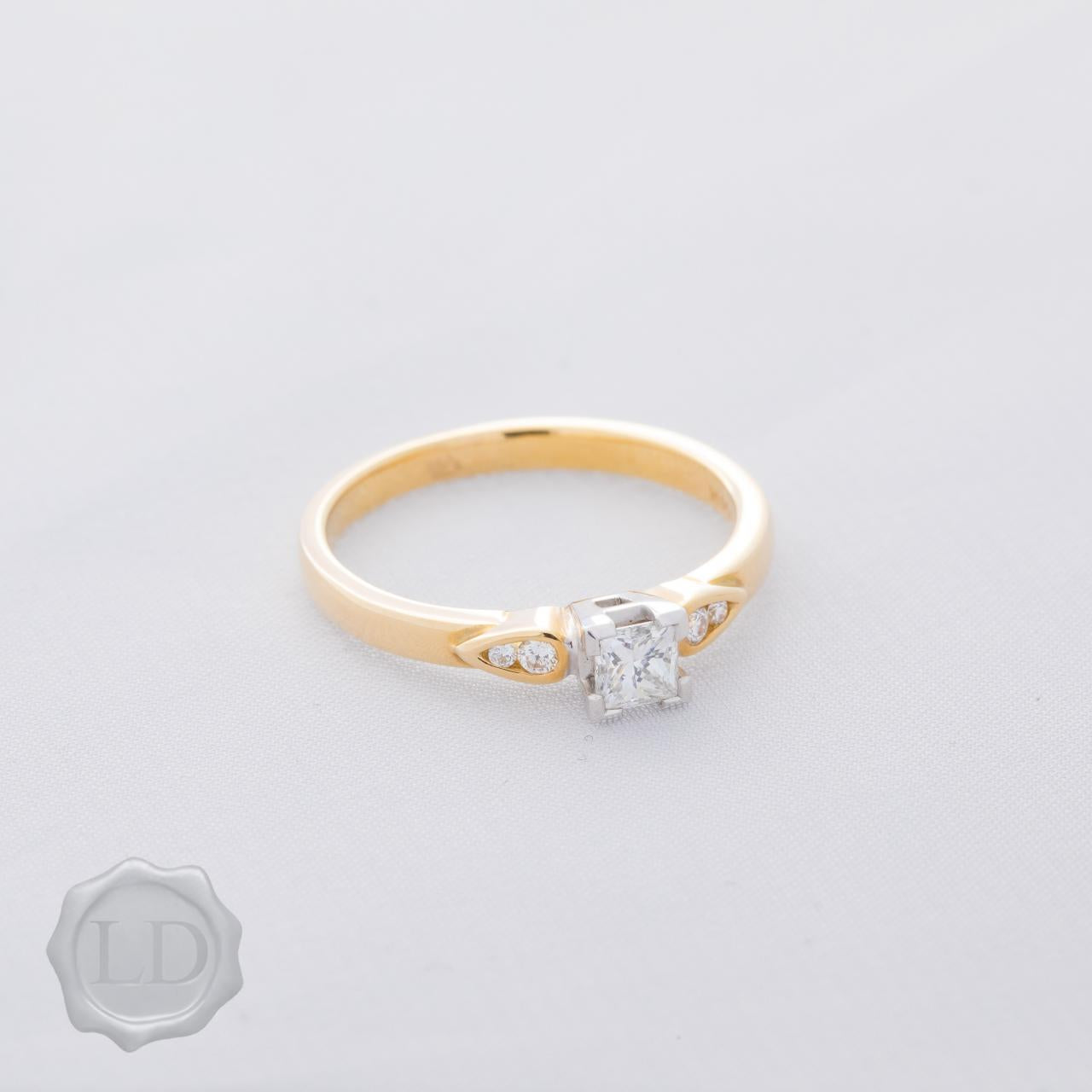 Yellow gold princess cut solitaire ring