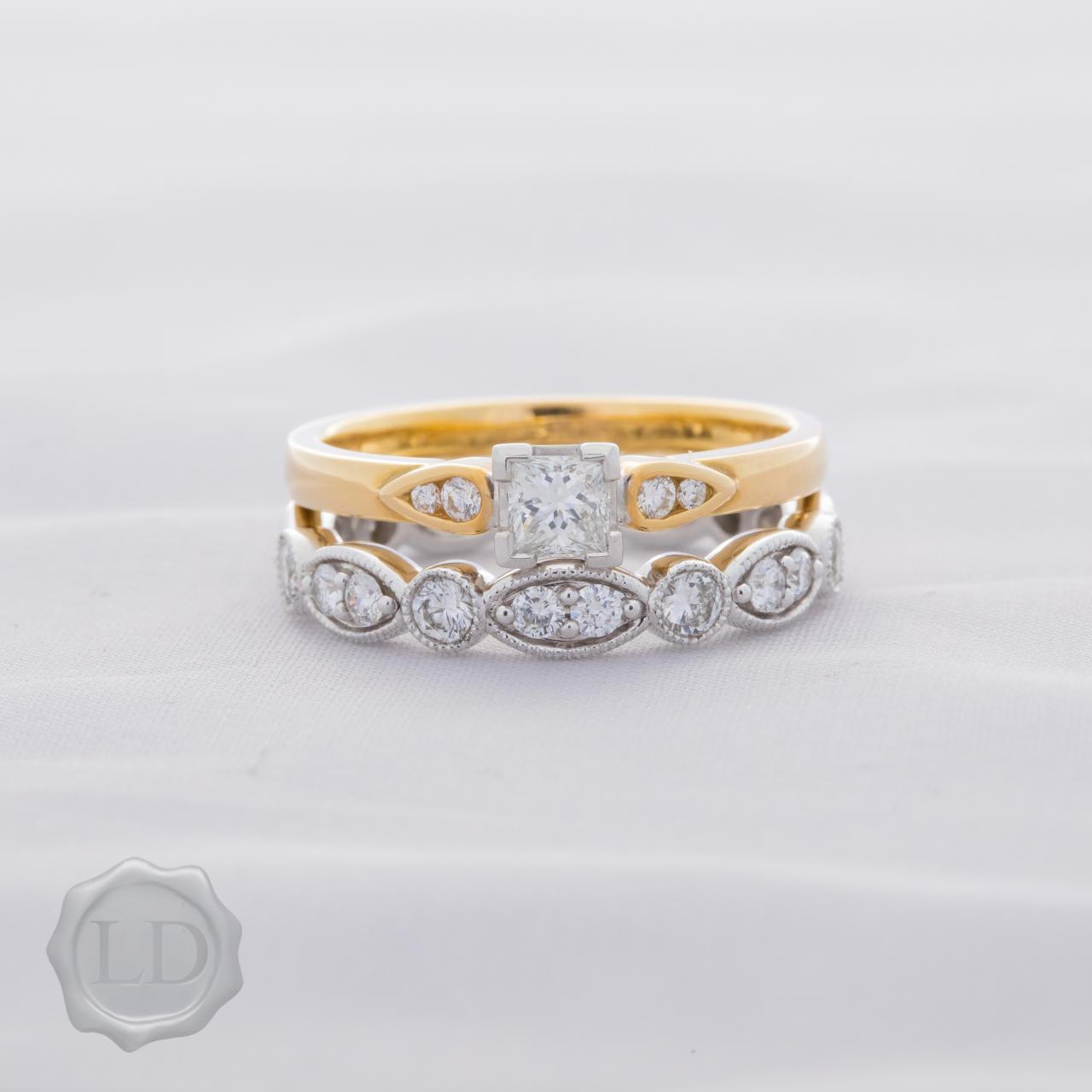 Yellow gold princess cut solitaire ring